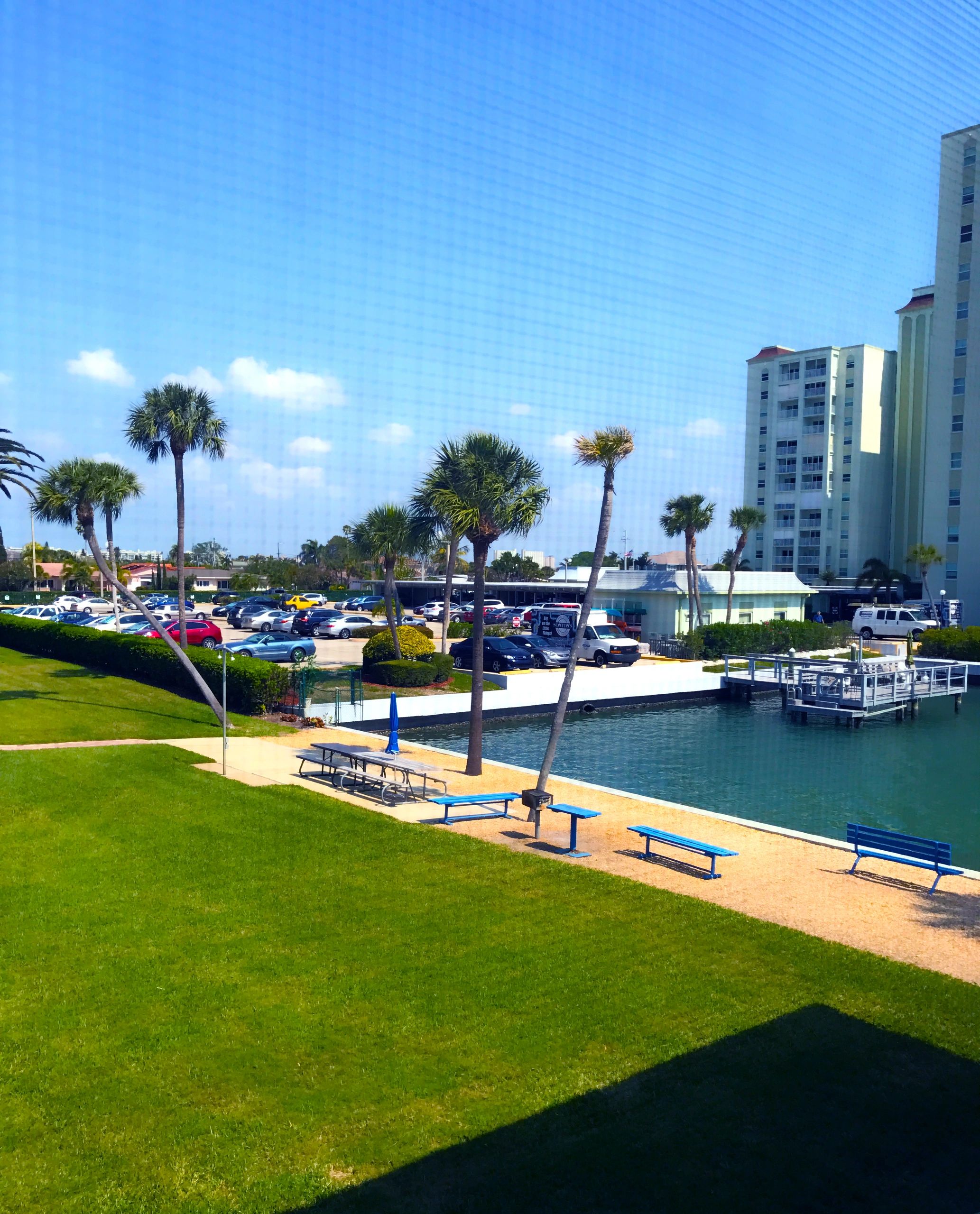 Waterfront community with sandy beach and picnic area