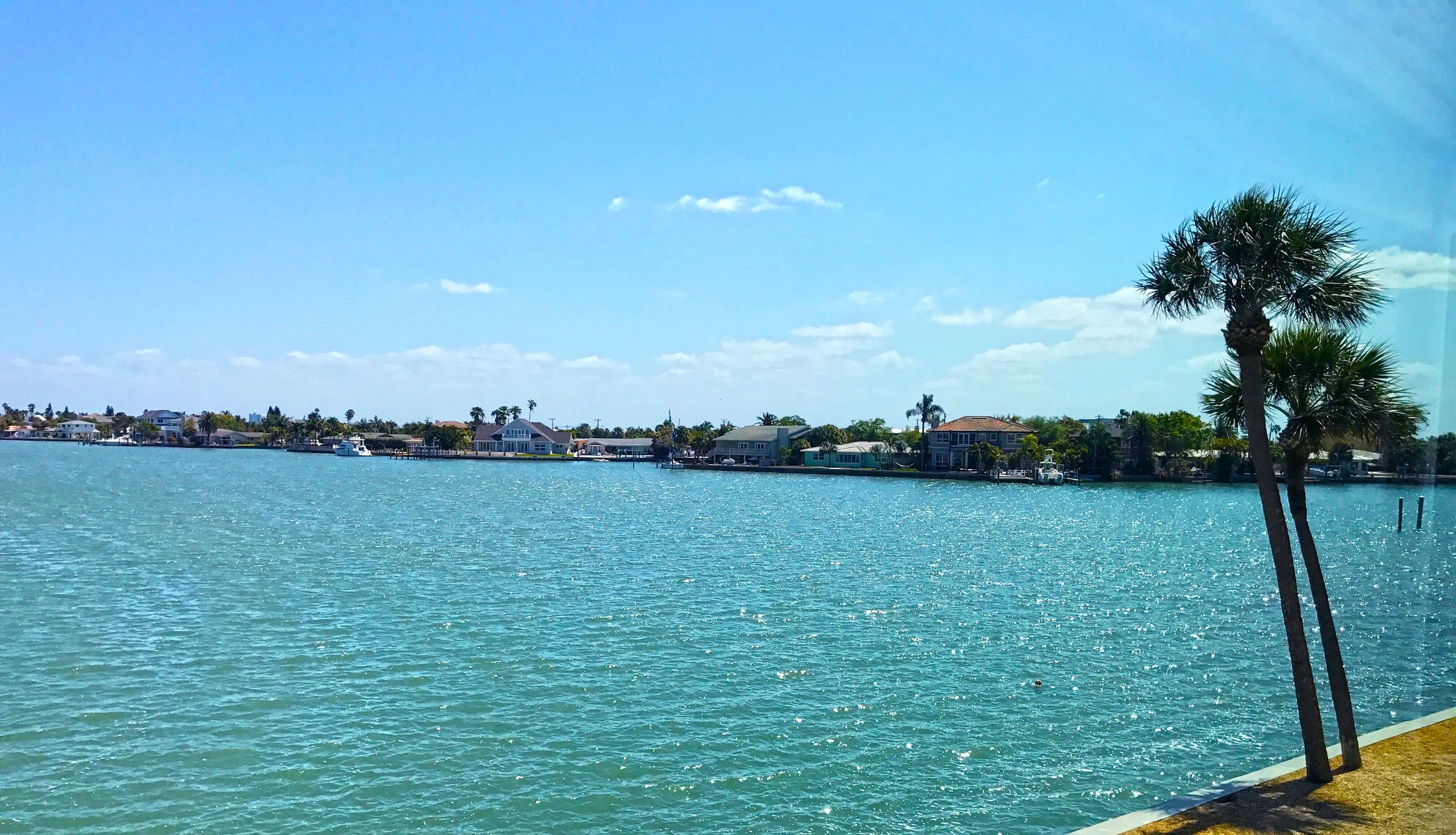 Scenic waterfront bay with palm trees — St. Pete Beach, Florida