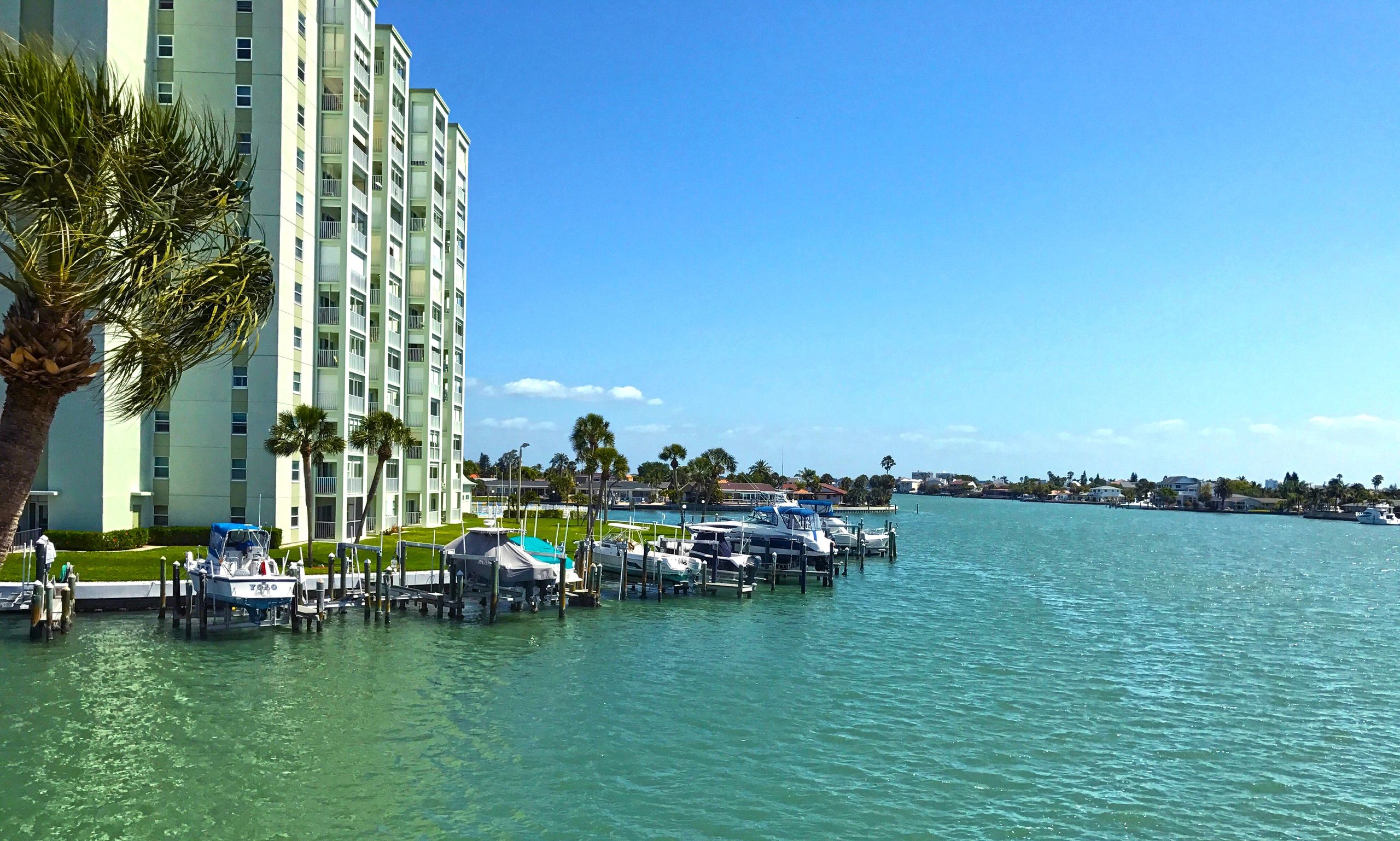 Waterfront residential building with turquoise water