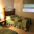 Cozy bedroom with green bedding