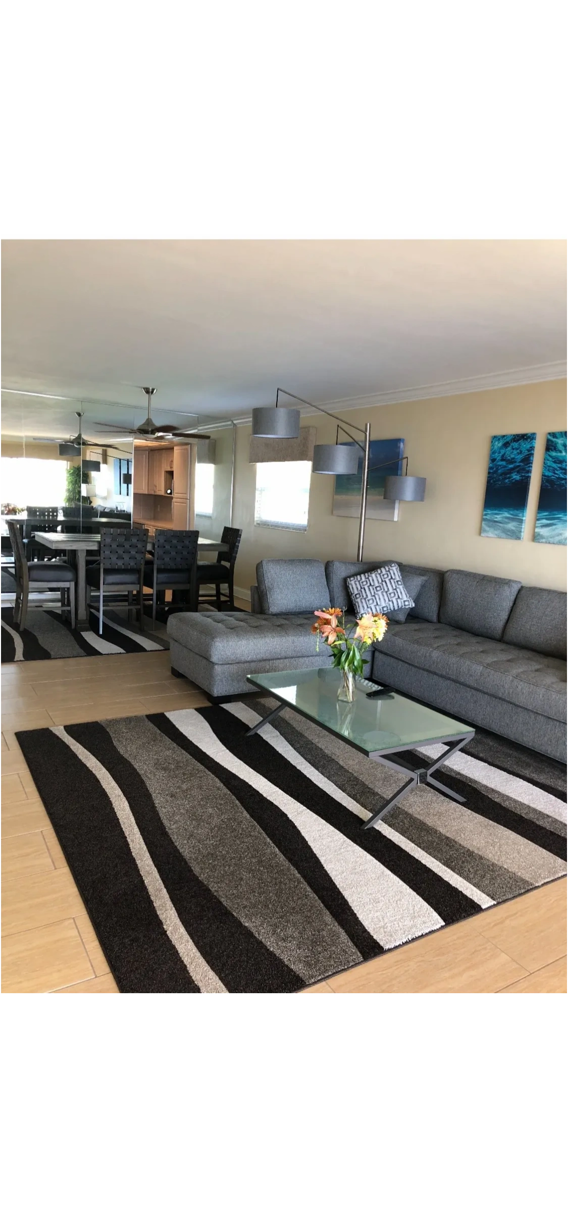 Open-concept living and dining space with sectional sofa