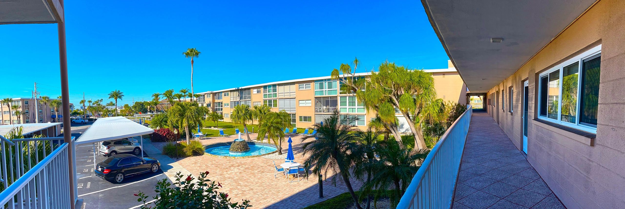 Aerial view of tropical resort and beachfront condo complex
