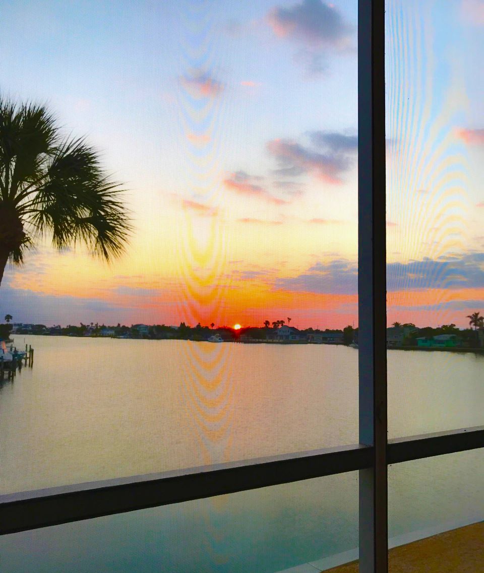 Sunset view from the balcony over the waterway